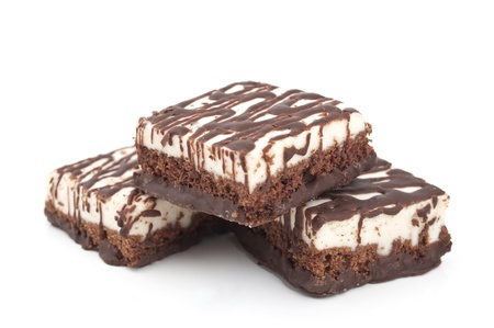 cake with chocolate icing on a white backgroundの写真素材