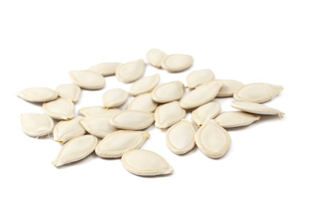 Pumpkin Seeds on a white backgroundの写真素材
