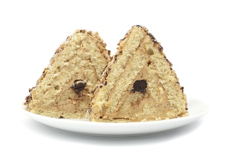 piece of cake with nuts on white backgroundの写真素材