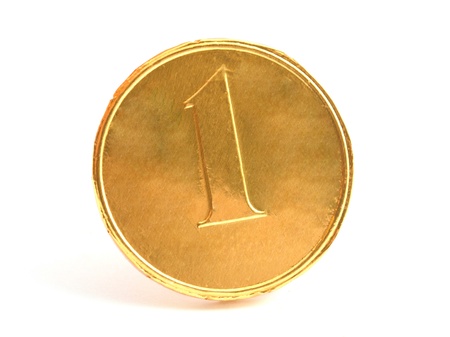 chocolate gold penny on a white background