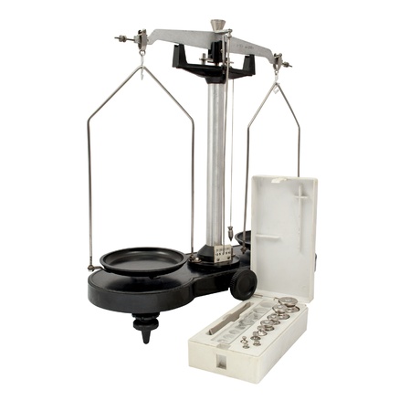old laboratory scales on a white backgroundの写真素材