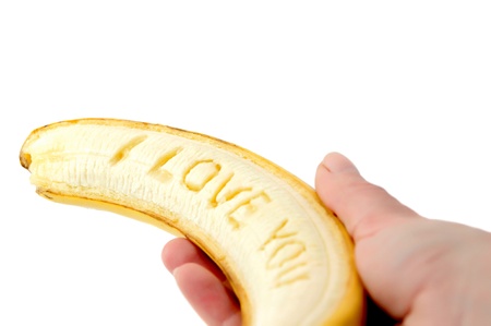 a banana with the words "I love you" on a white backgroundの写真素材