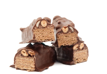 chocolate candy with nuts on white background