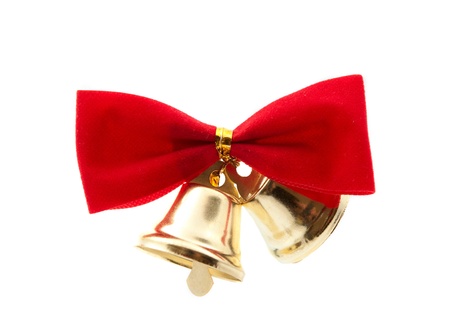 bells with a bow on a white backgroundの写真素材