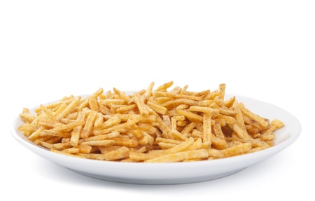Fried potato sticks on a white background