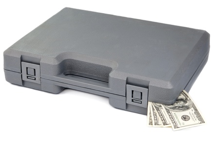 gray case with bills of dollars on a white background