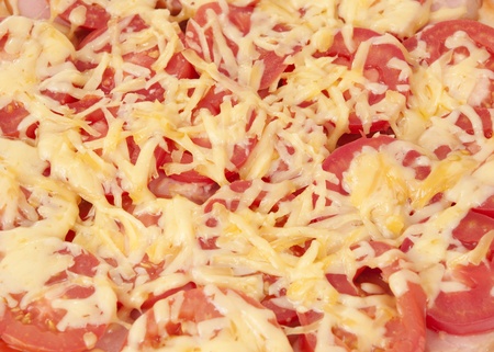 texture of pizza with tomatoes and cheeseの写真素材
