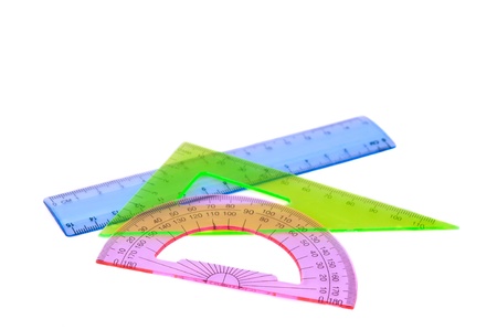 ruler, protractor, triangle on a white background