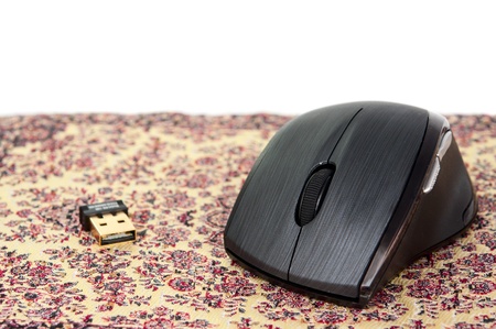 computer mouse on a mat on a white backgroundの写真素材