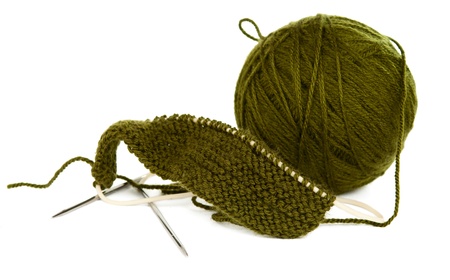 a ball of thread to knitting on a white backgroundの写真素材