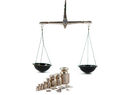 A set of precision weights for a balance scale.