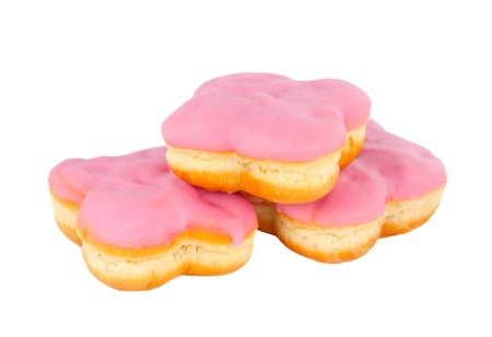 donut with pink frosting on white backgroundの写真素材