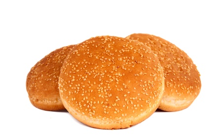 buns with sesame seeds on a white background