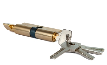 lock with the keys on white backgroundの写真素材