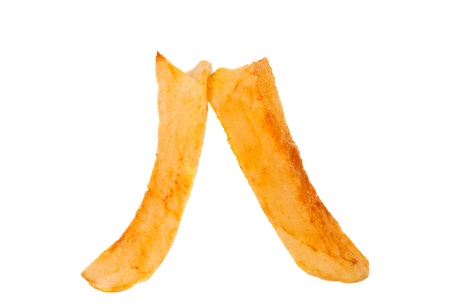 Fried potato chips isolated on white backgroundの写真素材