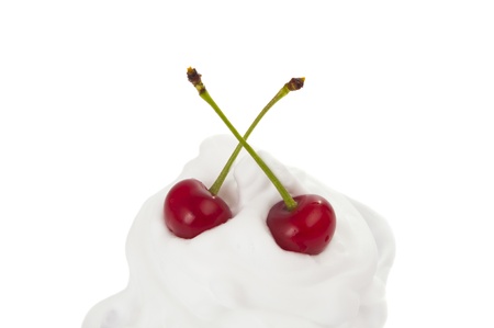 Cherry and cream isolated on white backgroundの写真素材