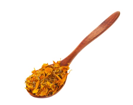 spice turmeric  in wooden spoon isolated on a white background isolated on white backgroundの写真素材