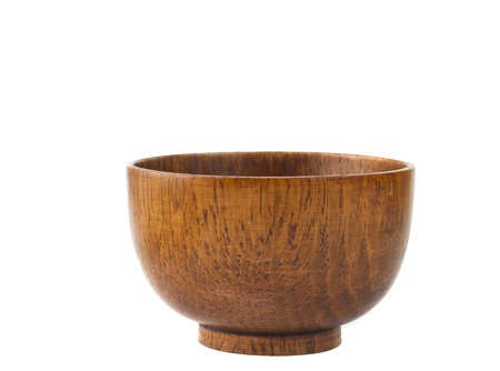 Wooden bowl. Isolated on white backgroundの写真素材