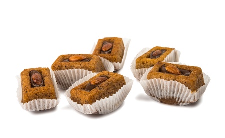 chocolate muffins with walnuts isolated on white backgroundの写真素材
