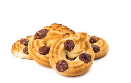 Fresh cookies with a cherry on a white backgroundの写真素材