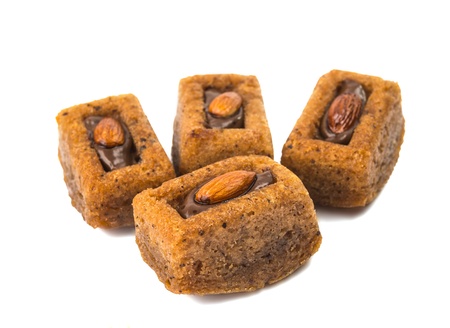 chocolate muffins with walnuts isolated on white backgroundの写真素材