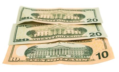 dollars isolated on white backgroundの写真素材