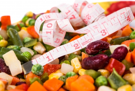 Frozen mixed vegetables on white backgroundの写真素材