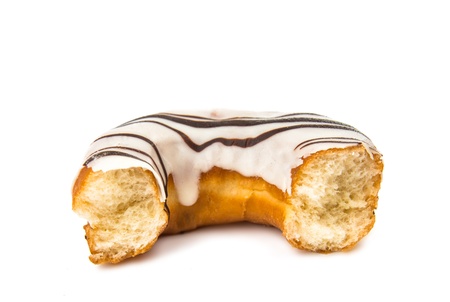 iced donut isolated on white backgroundの写真素材