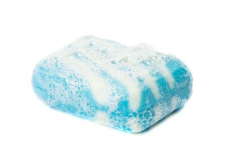 blue soap with foam on white backgroundの写真素材