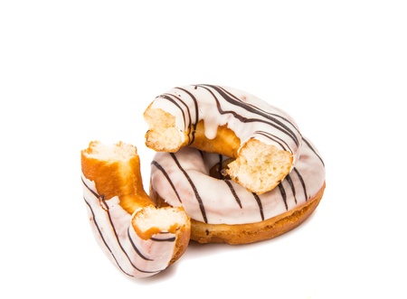 iced donut isolated on white backgroundの写真素材