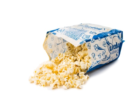 popcorn in a paper bag on white backgroundのeditorial素材