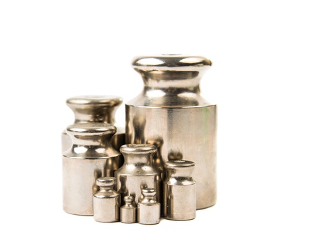 Calibration weight silver, isolated on white backgroundの写真素材