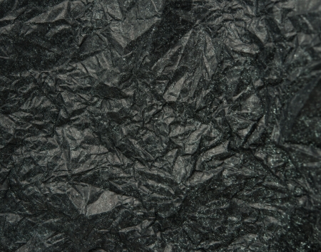 Crumpled Black Paper for backgroundの写真素材