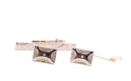 cufflinks on a white background