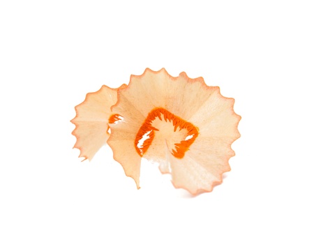 wood shavings from a pencil on a white backgroundの写真素材