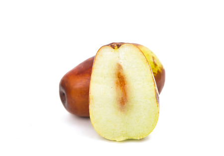 chinese jujubes isolated on white backgroundの写真素材