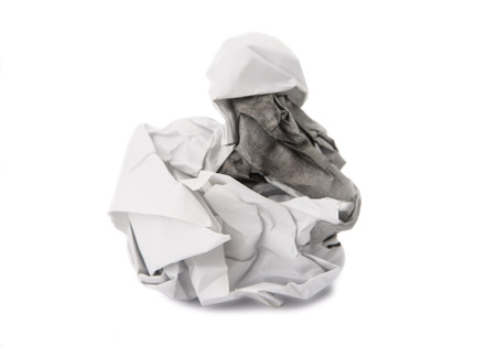 Crumpled paper on white の写真素材