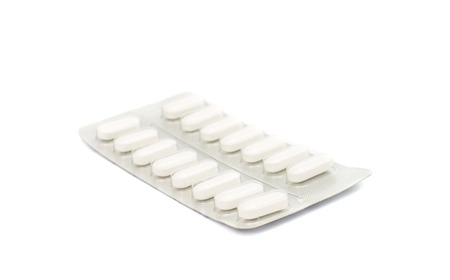 pack of pills isolated on white の写真素材
