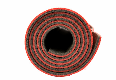 Red yoga mat nice for exercise at home or gymの写真素材