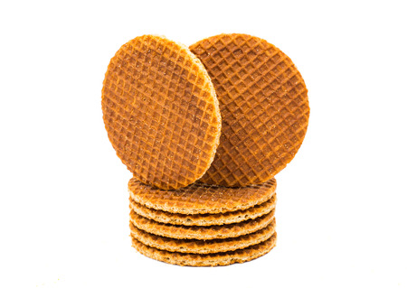 Dutch waffle called a stroopwafel on a white backgroundの写真素材