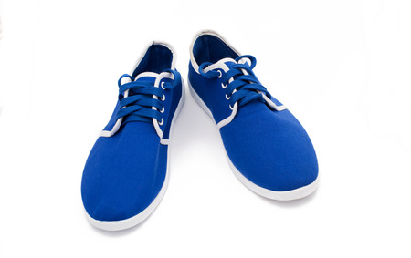 blue sports shoes on a white backgroundの写真素材