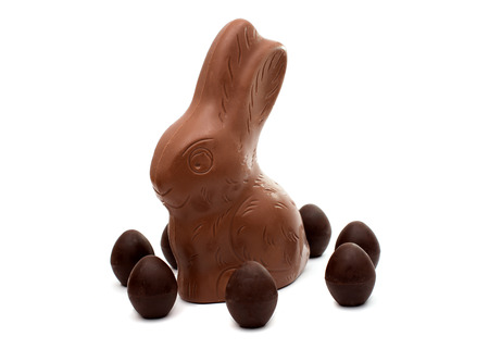 chocolate bunny with chocolate eggs isolated on white background