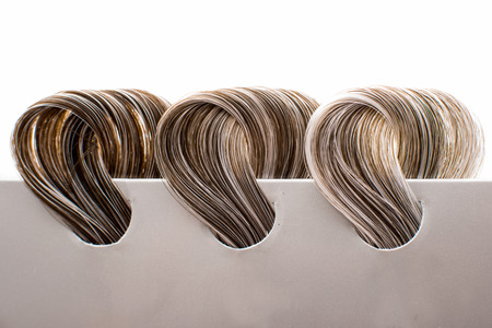 locks of hair with gray on white backgroundの写真素材