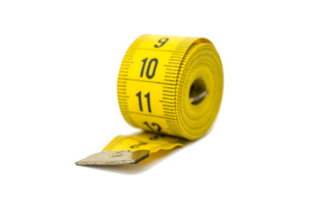 yellow measuring tape on white background