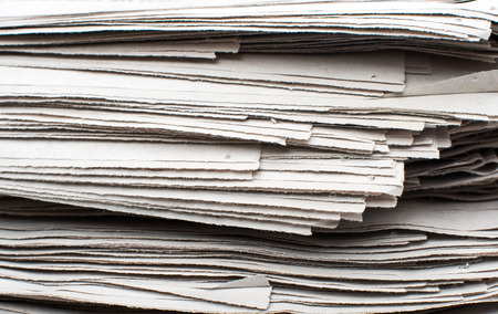 Closeup of stack of newspapersの写真素材