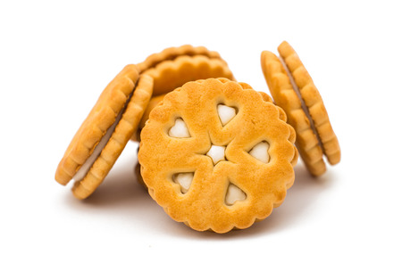 sandwich biscuits with white cream isolated on white background