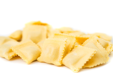 Ravioli pasta squares isolated over white background.の写真素材