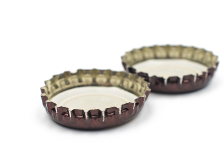 beer bottle cap on a white backgroundの写真素材