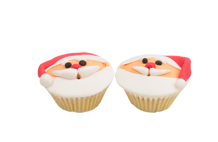 Christmas cupcakes on a white backgroundの写真素材