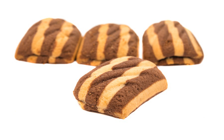 delicious chocolate striped cookies isolated on whiteの写真素材